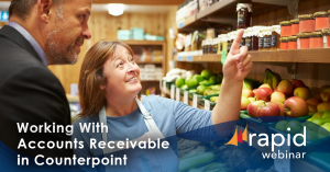 Retail employee assisting customer in a grocery store. This webinar will be discussing optimized accounts receivable management in NCR Counterpoint from Rapid POS.